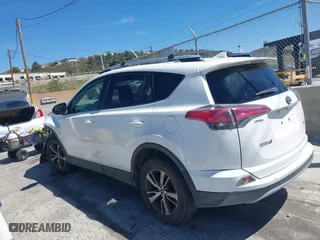 2016 Toyota RAV4 XLE with VIN JTMWFREV5GJ098870, listed as a IAAI auction lot 41878605 with 109,996 mi miles. Bid and sale history available at carsss.com. Image 3.