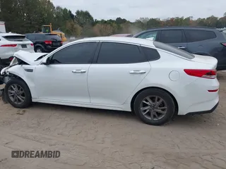 2019 Kia Optima LX with VIN 5XXGT4L30KG300576, listed as a IAAI auction lot 40753034 with 113,721 mi miles. Bid and sale history available at carsss.com. Image 14.