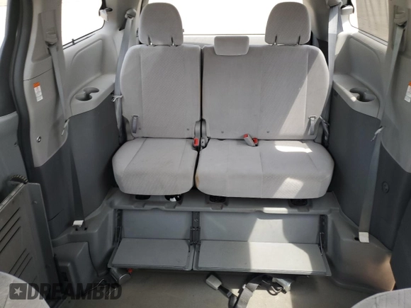 2016 Toyota Sienna LE AAS с VIN 5TDKK3DC7GS763990, выставлен на аукционе Copart как лот 57080655 с пробегом 74 036 миль миль и Списание • Salvage title. История ставок и продаж доступна на DreamBid. Изображение 10.