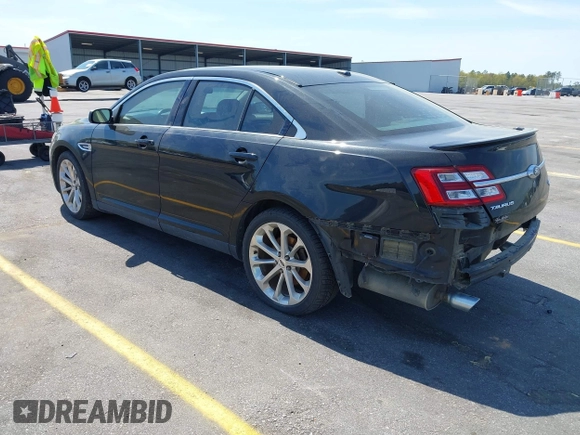 2015 Ford Taurus Limited with VIN 1FAHP2J81FG134973, listed as a IAAI auction lot 41845384 with 139,203 mi miles. Bid and sale history available at carsss.com. Image 3.