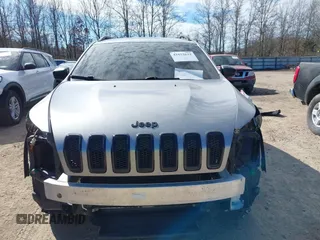 2016 Jeep Cherokee Sport with VIN 1C4PJMAS5GW348869, listed as a IAAI auction lot 41672622 with 166,330 mi miles. Bid and sale history available at carsss.com. Image 13.