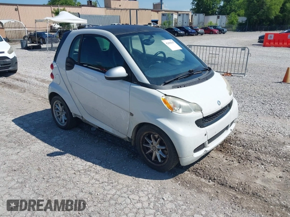 2015 Smart fortwo Passion z VIN WMEEJ3BA4FK791268, wystawiony jako IAAI lot #42496547 z przebiegiem 257 540 mil mil oraz . Historia ofert i sprzedaży dostępna na DreamBid. Obrazek 1.