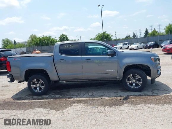 2018 Chevrolet Colorado 4WD Z71 with VIN 1GCGTDENXJ1247717, listed as a IAAI auction lot 42557264 with 91,463 mi miles and . Bid and sale history available at DreamBid. Image 13.