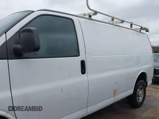 2015 Chevrolet Express Cargo Van with VIN 1GCWGFCFXF1259591, listed as a IAAI auction lot 42029679 with 144,023 mi miles. Bid and sale history available at carsss.com. Image 14.
