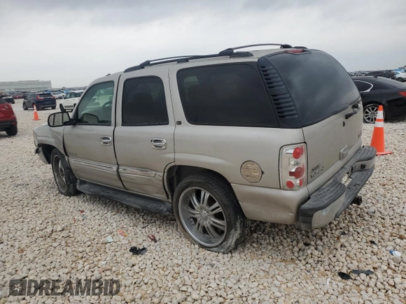 2004 GMC Yukon SLT with VIN 1GKEC13Z34R313210, listed as a Copart auction lot 51150575 with 328,961 mi miles and Salvage Title. Bid and sale history available at carsss.com. Image 2.