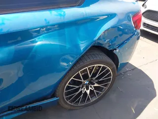2018 BMW M2 z VIN WBS1J5C59JVE51997, wystawiony jako IAAI lot #42348421 z przebiegiem 51 376 mil mil oraz . Historia ofert i sprzedaży dostępna na DreamBid. Obrazek 18.