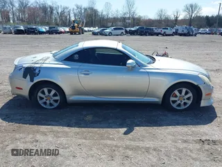 2005 Lexus SC 430 z VIN JTHFN48Y450071558, wystawiony jako IAAI lot #41939636 z przebiegiem 158 402 mil mil oraz . Historia ofert i sprzedaży dostępna na DreamBid. Obrazek 13.