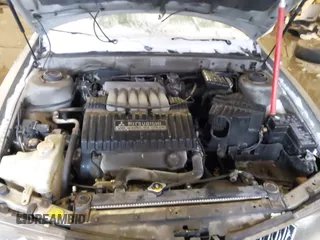 2002 Mitsubishi Diamante LS z VIN 6MMAP67P32T005867, wystawiony jako IAAI lot #41586460 z przebiegiem 390 586 mil mil oraz . Historia ofert i sprzedaży dostępna na DreamBid. Obrazek 10.