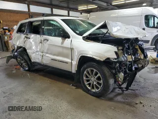 2017 Jeep Grand Cherokee Limited 75th Anniversary with VIN 1C4RJFBT6HC667826, listed as a Copart auction lot 61776815 with 169,327 mi miles and Salvage title. Bid and sale history available at DreamBid. Image 4.