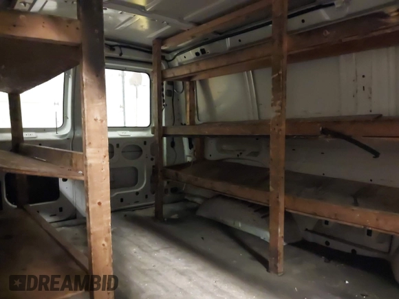 2007 Ford Econoline Cargo Commercial with VIN 1FTNE14W47DA86573, listed as a IAAI auction lot 41294485 with 197,325 mi miles and . Bid and sale history available at DreamBid. Image 8.