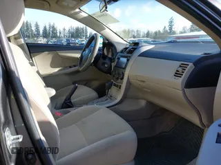2013 Toyota Corolla L with VIN 2T1BU4EE3DC030761, listed as a IAAI auction lot 42004033 with 90,733 mi miles. Bid and sale history available at carsss.com. Image 5.