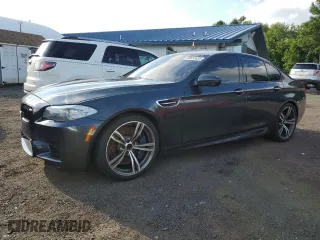 2013 BMW M5 with VIN WBSFV9C5XDD096847, listed as a Copart auction lot 69652454 with 73,632 mi miles and Clean Title. Bid and sale history available at carsss.com. Image 1.