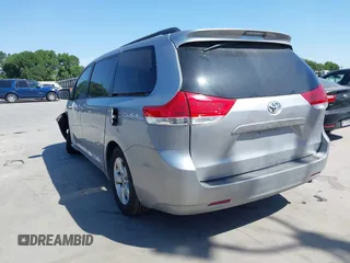 2014 Toyota Sienna LE AAS with VIN 5TDKK3DC4ES447265, listed as a IAAI auction lot 42024631 with 112,890 mi miles and . Bid and sale history available at carsss.com. Image 3.