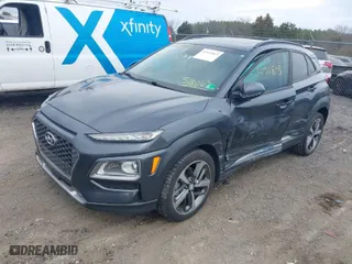 2020 Hyundai Kona Ultimate with VIN KM8K5CA56LU518063, listed as a IAAI auction lot 41911813 with 69,087 mi miles. Bid and sale history available at carsss.com. Image 2.