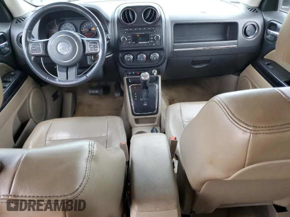 2014 Jeep Patriot High Altitude with VIN 1C4NJPFA2ED888925, listed as a Copart auction lot 60191435 with 122,308 mi miles and Salvage title. Bid and sale history available at DreamBid. Image 8.
