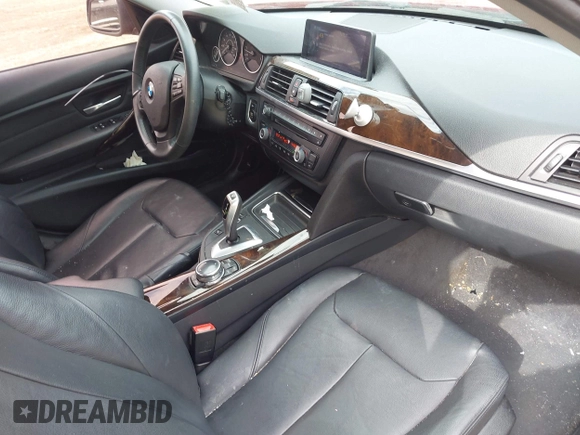 2014 BMW 3 Series 320i xDrive with VIN WBA3C3G5XENS69749, listed as a IAAI auction lot 42052481 with 112,306 mi miles and . Bid and sale history available at carsss.com. Image 5.