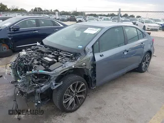 2022 Toyota Corolla SE with VIN 5YFS4MCE6NP132723, listed as a IAAI auction lot 41685699 with 25,228 mi miles. Bid and sale history available at carsss.com. Image 2.