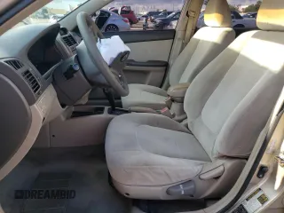 2006 Kia Spectra EX with VIN KNAFE121765256944, listed as a Copart auction lot 68667844 with 98,316 mi miles and Salvage Title. Bid and sale history available at carsss.com. Image 7.