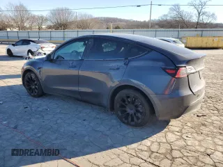 2021 Tesla Model Y Long Range with VIN 5YJYGDEE0MF088159, listed as a Copart auction lot 88668465 with 131,414 mi miles and Salvage Title. Bid and sale history available at DreamBid. Image 2.