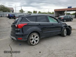 2019 Ford Escape Titanium с VIN 1FMCU9J92KUA82033, выставлен на аукционе Copart как лот 56686235 с пробегом Не указан миль и Списание • Salvage title. История ставок и продаж доступна на DreamBid. Изображение 3.