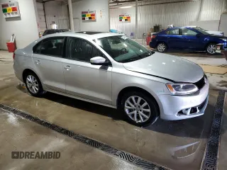 2012 Volkswagen Jetta Sedan SE w/Convenience & Sunroof with VIN 3VWDX7AJXCM401907, listed as a Copart auction lot 53448685 with 122,024 mi miles and Salvage Title. Bid and sale history available at carsss.com. Image 4.