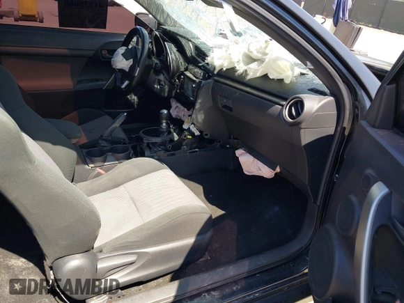 2015 Scion tC with VIN JTKJF5C77F3094936, listed as a IAAI auction lot 41830668 with 89,727 mi miles. Bid and sale history available at carsss.com. Image 5.