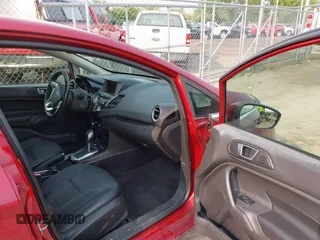 2015 Ford Fiesta Titanium z VIN 3FADP4FJ1FM171680, wystawiony jako IAAI lot #42383105 z przebiegiem 51 396 mil mil oraz . Historia ofert i sprzedaży dostępna na DreamBid. Obrazek 5.