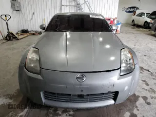 2004 Nissan 350Z Touring z VIN JN1AZ34D74T162174, wystawiony jako Copart lot #56205705 z przebiegiem 184 048 mil mil oraz Czysty tytuł • Clean title. Historia ofert i sprzedaży dostępna na DreamBid. Obrazek 5.