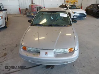 2001 Saturn SL z VIN 1G8ZF52841Z208220, wystawiony jako IAAI lot #42288195 z przebiegiem Nie podano mil oraz . Historia ofert i sprzedaży dostępna na DreamBid. Obrazek 6.