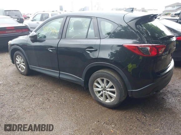2013 Mazda CX-5 Sport with VIN JM3KE2BE8D0125002, listed as a IAAI auction lot 42425404 with 183,551 mi miles and . Bid and sale history available at DreamBid. Image 3.