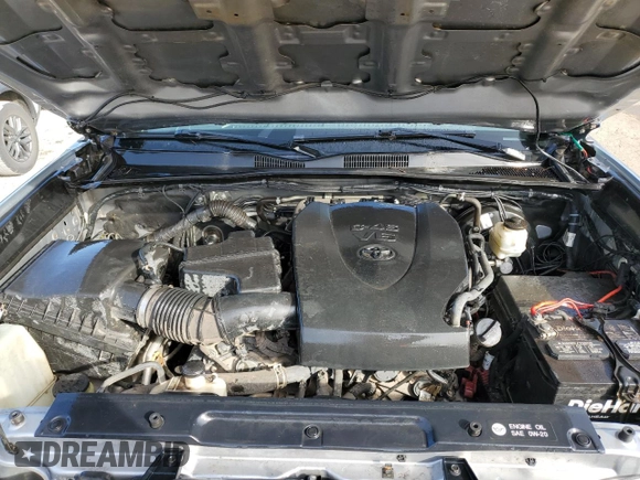 2017 Toyota Tacoma SR5 z VIN 5TFCZ5AN5HX121765, wystawiony jako Copart lot #53449835 z przebiegiem 115 980 mil mil oraz Szkoda całkowita • Salvage title. Historia ofert i sprzedaży dostępna na DreamBid. Obrazek 11.