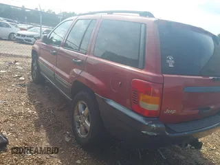 2004 Jeep Grand Cherokee Laredo with VIN 1J4GW48S34C419596, listed as a IAAI auction lot 42515494 with 276,196 mi miles and . Bid and sale history available at DreamBid. Image 3.