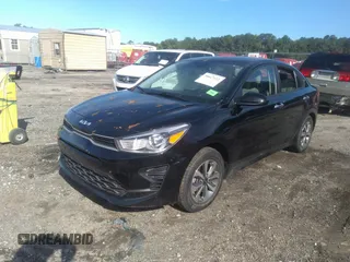 2023 Kia Rio S with VIN 3KPA24AD5PE531705, listed as a IAAI auction lot 39817112 with 73,997 mi miles. Bid and sale history available at carsss.com. Image 17.