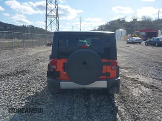 2015 Jeep Wrangler Sport with VIN 1C4AJWAG7FL582721, listed as a IAAI auction lot 41989505 with 102,961 mi miles. Bid and sale history available at carsss.com. Image 16.