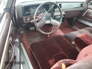 1987 GMC Caballero z VIN 3GTCW80H3HS801798, wystawiony jako Copart lot #49308615 z przebiegiem 91 576 mil mil oraz Tytuł czysty. Historia ofert i sprzedaży dostępna na DreamBid. Obrazek 8.