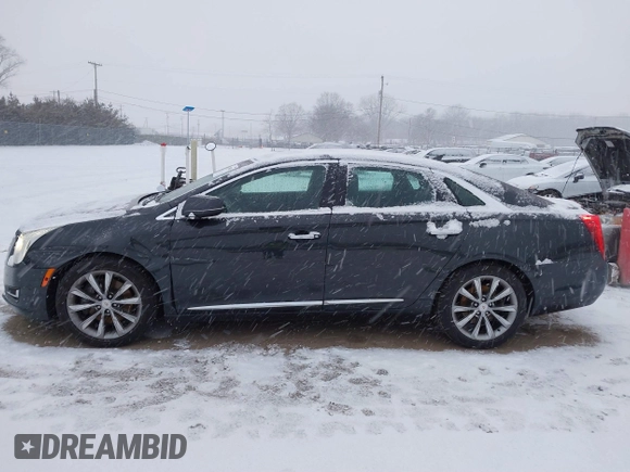 2013 Cadillac XTS with VIN 2G61N5S37D9112979, listed as a IAAI auction lot 41209826 with 83,237 mi miles. Bid and sale history available at carsss.com. Image 14.