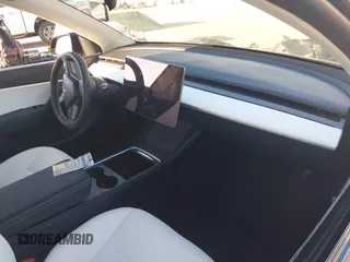 2022 Tesla Model Y Performance with VIN 7SAYGDEF0NF447541, listed as a IAAI auction lot 41762592 with 41,204 mi miles and . Bid and sale history available at DreamBid. Image 5.