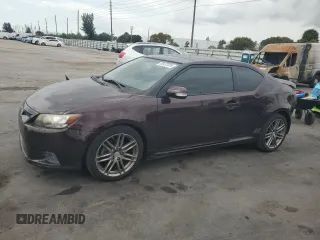 2012 Scion tC with VIN JTKJF5C7XC3032281, listed as a Copart auction lot 50472225 with 101,304 mi miles and Salvage Title. Bid and sale history available at carsss.com. Image 1.