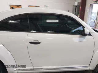 2017 Volkswagen Beetle 1.8T Fleet with VIN 3VWF17AT2HM629497, listed as a IAAI auction lot 41181493 with 68,564 mi miles. Bid and sale history available at carsss.com. Image 14.
