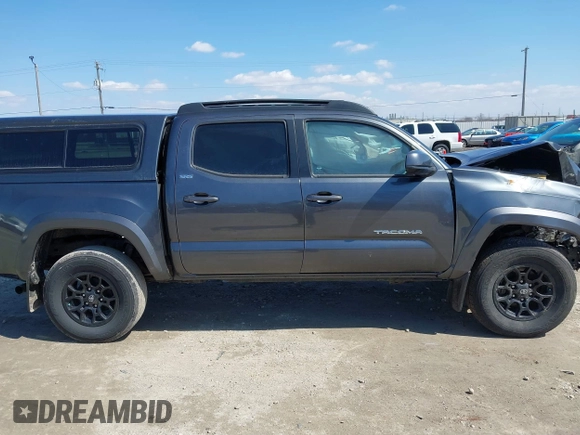 2021 Toyota Tacoma 4WD SR with VIN 3TMCZ5AN7MM442237, listed as a IAAI auction lot 41993450 with 30,148 mi miles. Bid and sale history available at carsss.com. Image 14.