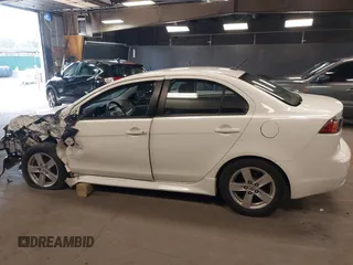 2014 Mitsubishi Lancer SE with VIN JA32V2FW1EU018927, listed as a IAAI auction lot 42059116 with 148,874 mi miles and . Bid and sale history available at carsss.com. Image 14.
