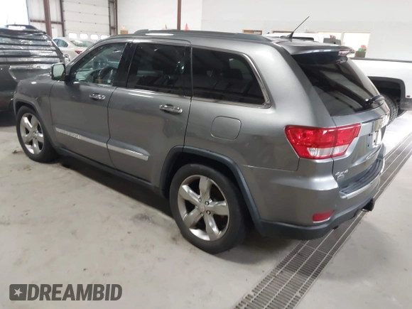 2013 Jeep Grand Cherokee Overland with VIN 1C4RJFCT9DC524605, listed as a IAAI auction lot 42016103 with 215,352 mi miles. Bid and sale history available at carsss.com. Image 3.