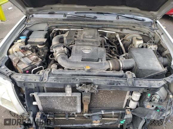 2010 Nissan Frontier SE with VIN 1N6AD0FVXAC420020, listed as a Copart auction lot 87324794 with 145,566 mi miles and Salvage title. Bid and sale history available at DreamBid. Image 11.