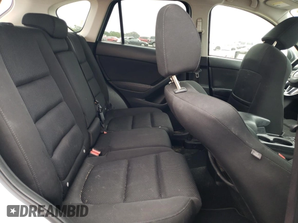 2016 Mazda CX-5 Touring with VIN JM3KE4CY6G0655381, listed as a Copart auction lot 53311445 with 145,513 mi miles and Salvage Title. Bid and sale history available at carsss.com. Image 10.