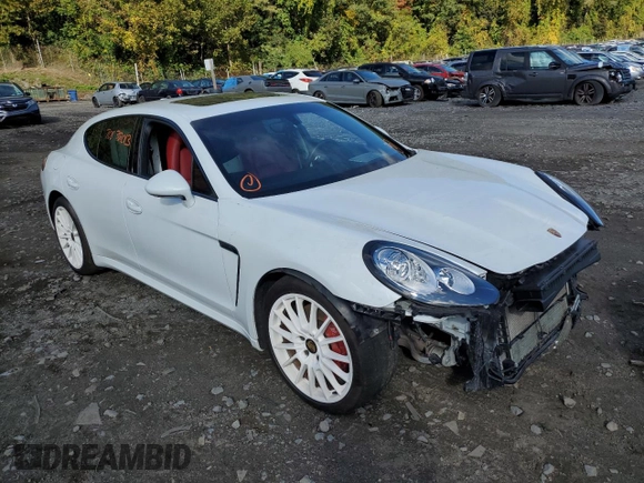 2016 Porsche Panamera 4 z VIN WP0AA2A7XGL001867, wystawiony jako Copart lot #70838013 z przebiegiem 34 127 mil mil oraz . Historia ofert i sprzedaży dostępna na DreamBid. Obrazek 4.