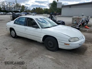 1999 Chevrolet Lumina with VIN 2G1WL52MXX1107255, listed as a Copart auction lot 76585174 with 153,962 mi miles and Salvage Title. Bid and sale history available at DreamBid. Image 4.