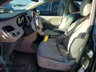 2012 Toyota Sienna XLE AAS z VIN 5TDYK3DC1CS220347, wystawiony jako Copart lot #65015615 z przebiegiem 168 629 mil mil oraz Szkoda całkowita • Salvage title. Historia ofert i sprzedaży dostępna na DreamBid. Obrazek 7.