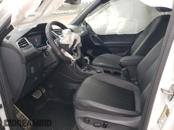 2023 Volkswagen Tiguan SE R-Line Black with VIN 3VV8B7AX8PM025044, listed as a Copart auction lot 53185355 with 35,565 mi miles and Salvage title. Bid and sale history available at DreamBid. Image 7.