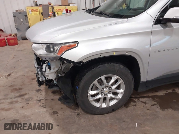 2018 Chevrolet Traverse LT Cloth z VIN 1GNEVGKW9JJ144070, wystawiony jako IAAI lot #42118002 z przebiegiem 142 006 mil mil oraz . Historia ofert i sprzedaży dostępna na DreamBid. Obrazek 18.