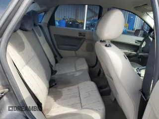 2009 Ford Focus SE z VIN 1FAHP35N89W175245, wystawiony jako Copart lot #55505205 z przebiegiem 125 645 mil mil oraz Szkoda całkowita • Salvage title. Historia ofert i sprzedaży dostępna na DreamBid. Obrazek 10.